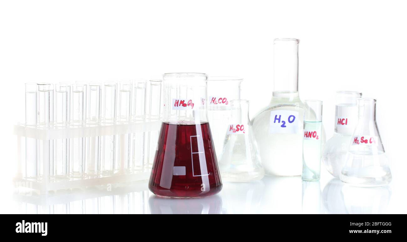 Test-tubes with various acids isolated on white Stock Photo - Alamy