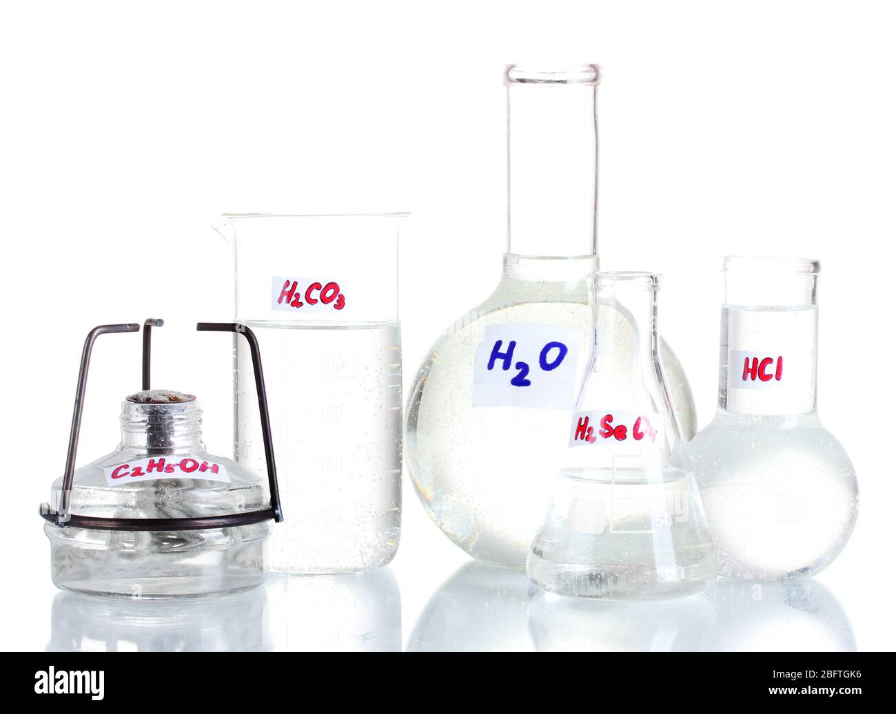 Test-tubes with various acids and chemicals isolated on white Stock ...