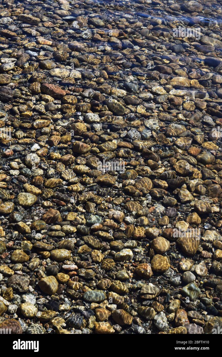 rocks in clear water Stock Photo