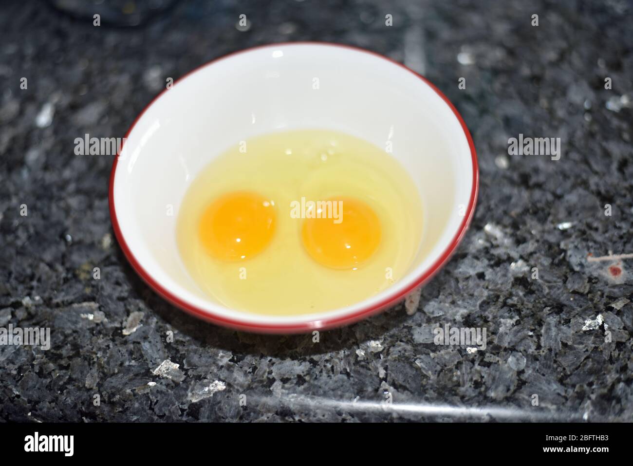 Raw Eggs in a Bowl Stock Photo