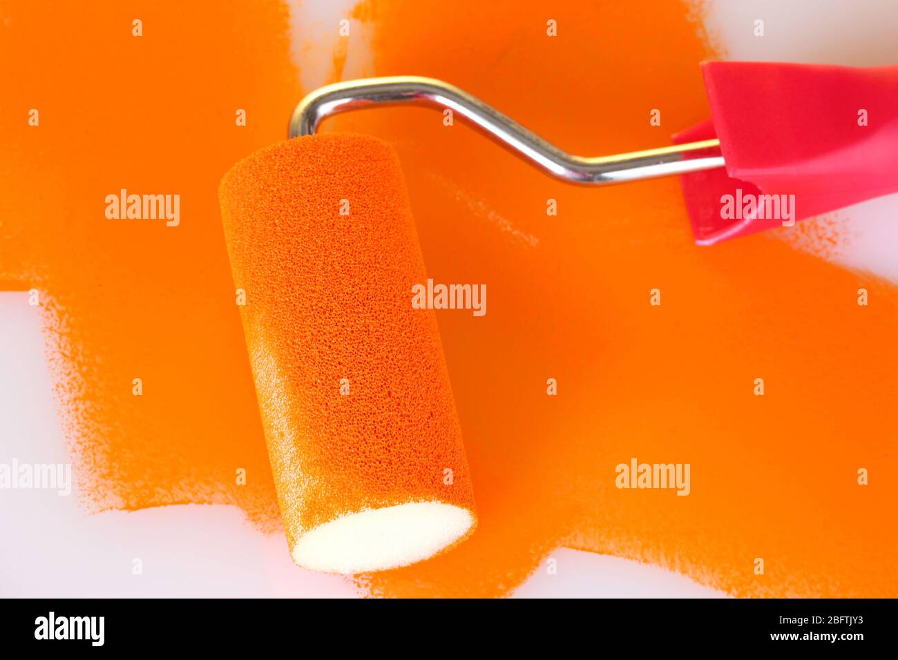 Paint roller with colors close-up Stock Photo - Alamy