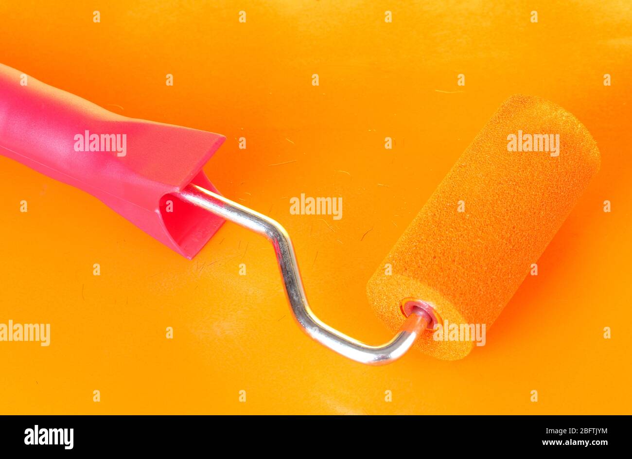 Paint roller with colors close-up Stock Photo - Alamy