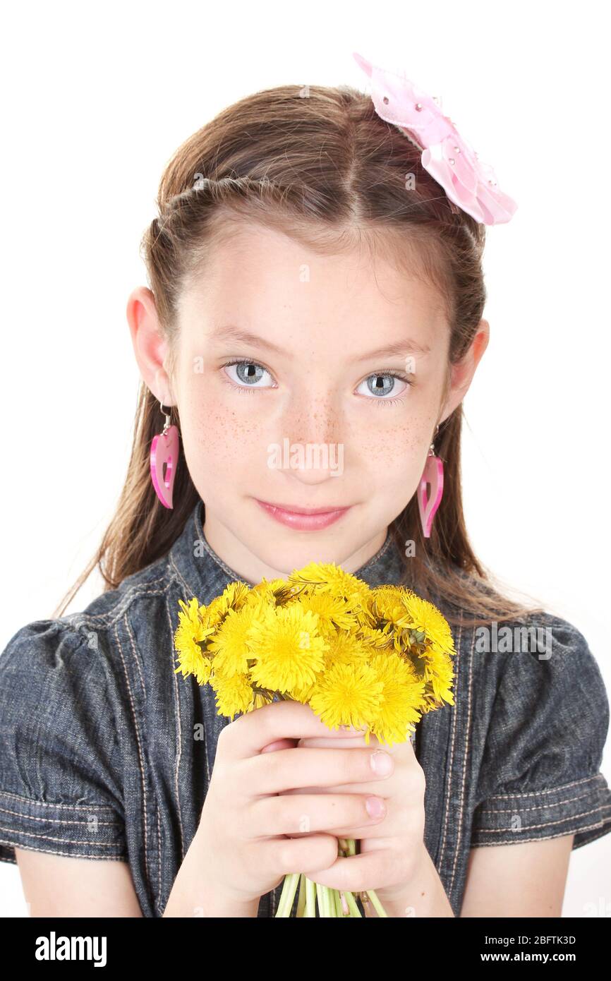 Portrait of beautiful little girl with dandelions isolated on white ...