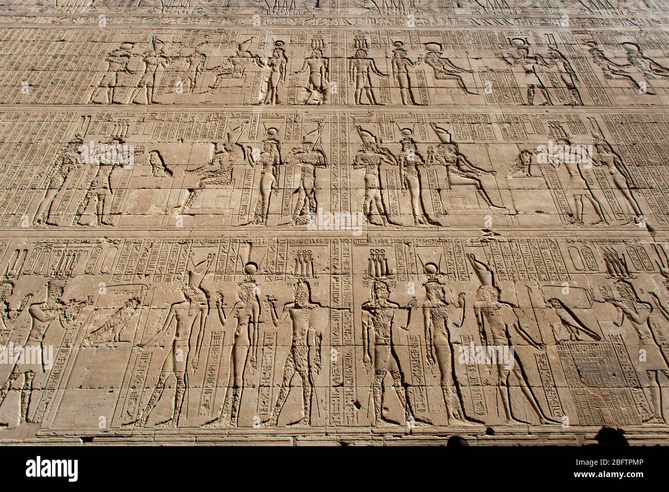 Hieroglyphics Reliefs on a wall at the Temple of Horus, at Edfu, Egypt. Stock Photo