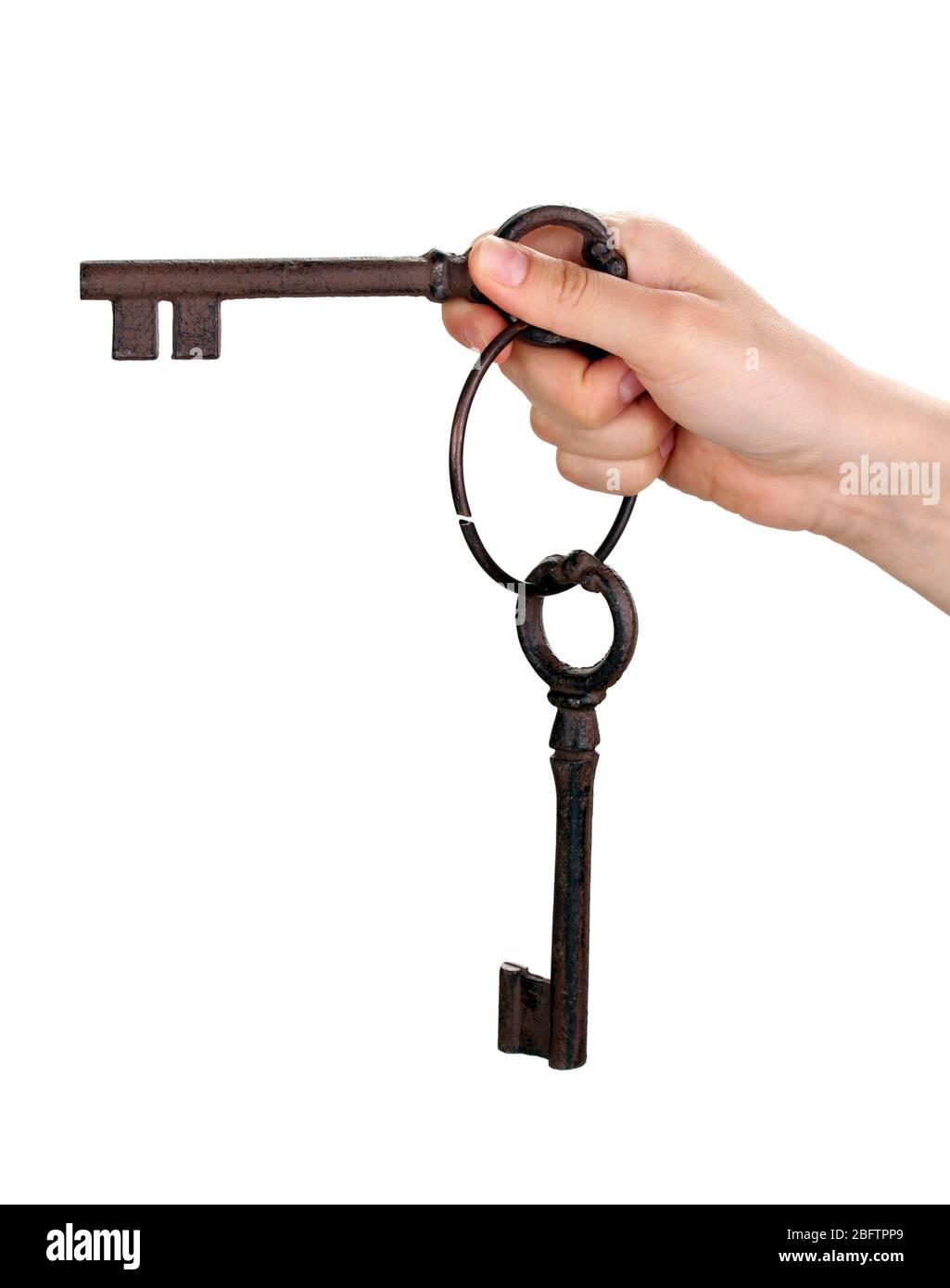 woman's hand holding an antique key on white background Stock Photo - Alamy