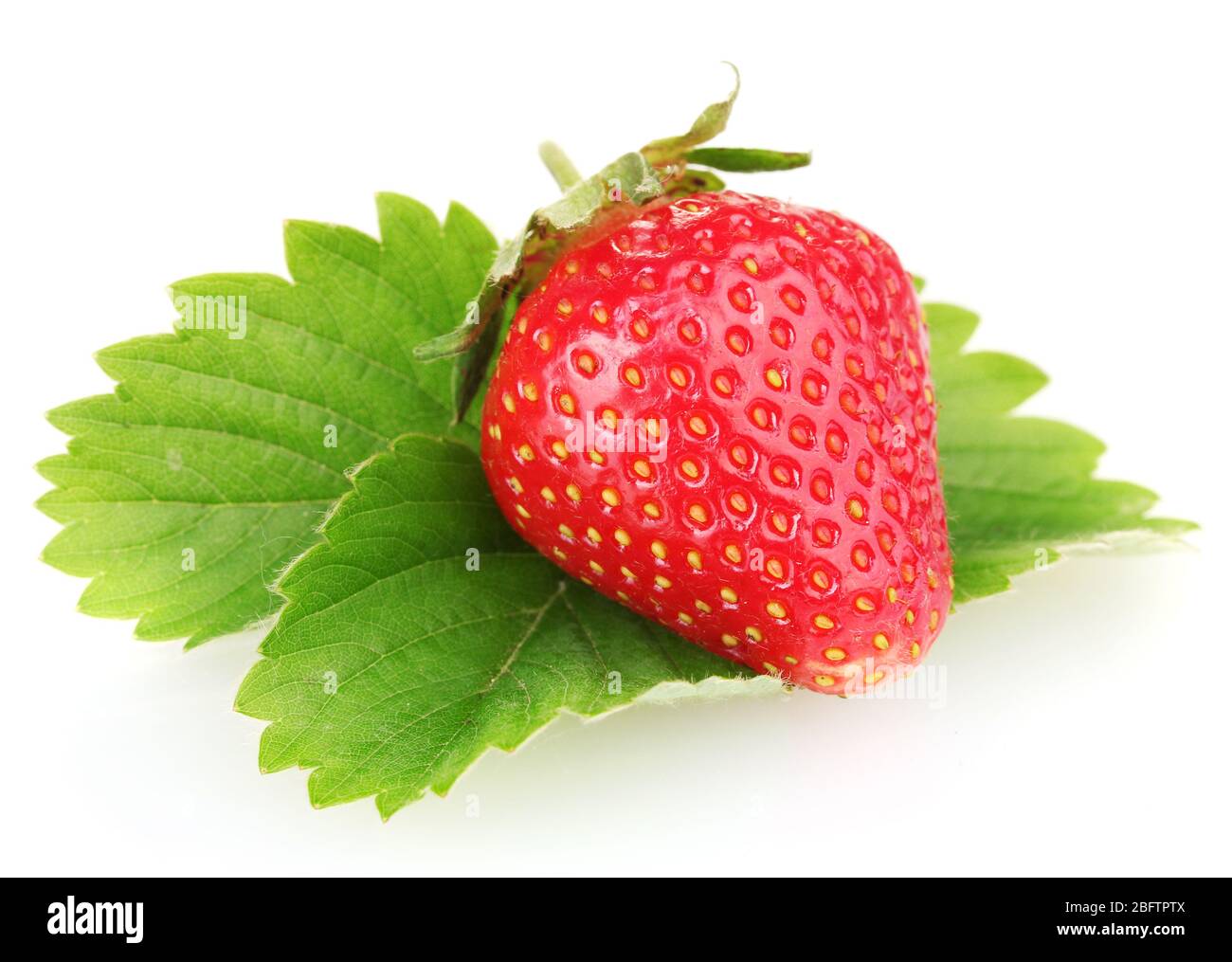 sweet ripe strawberry with leaves isolated on white Stock Photo - Alamy