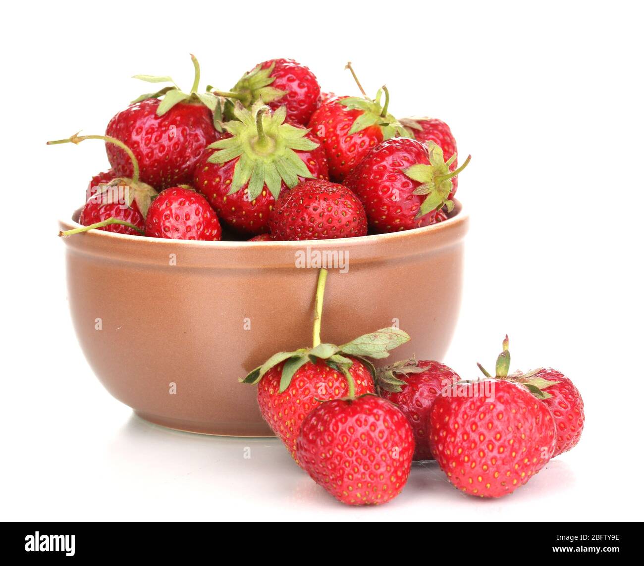 Sweet ripe strawberries in glass bowl isolated on white Stock Photo - Alamy