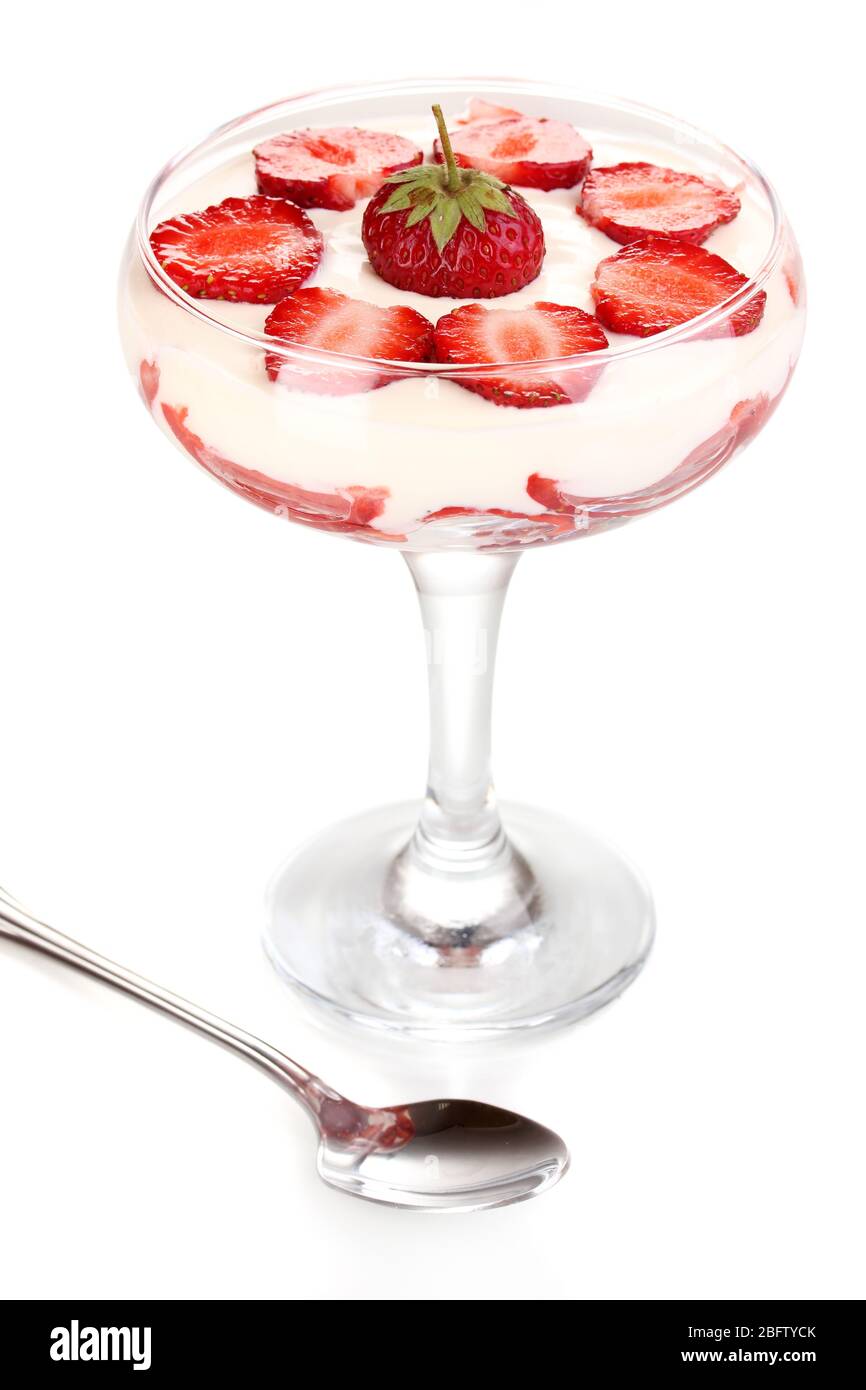 Glass of ripe strawberries with cream isolated on white Stock Photo - Alamy