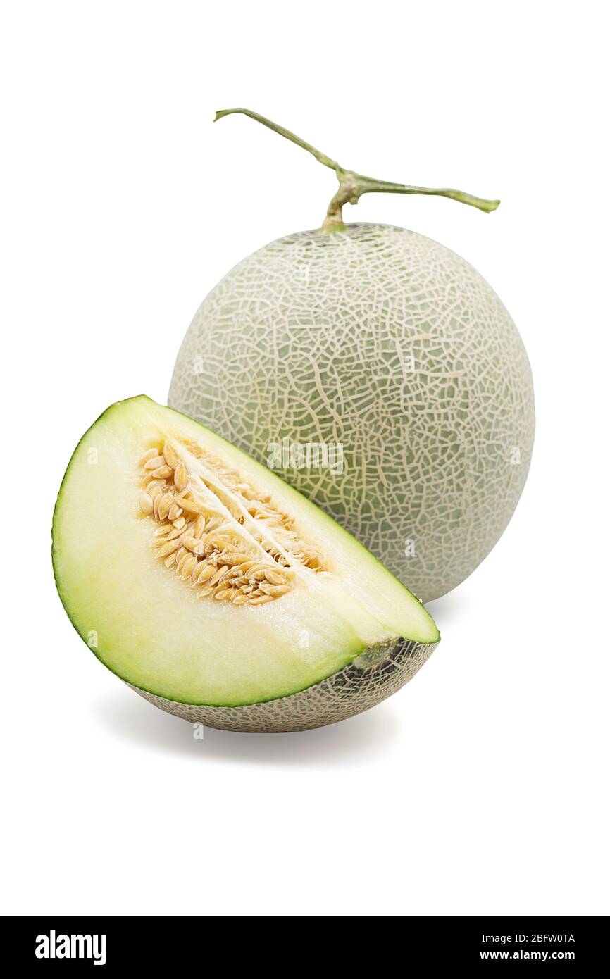 Organic japanese honeydew melon and a half on white isolated background