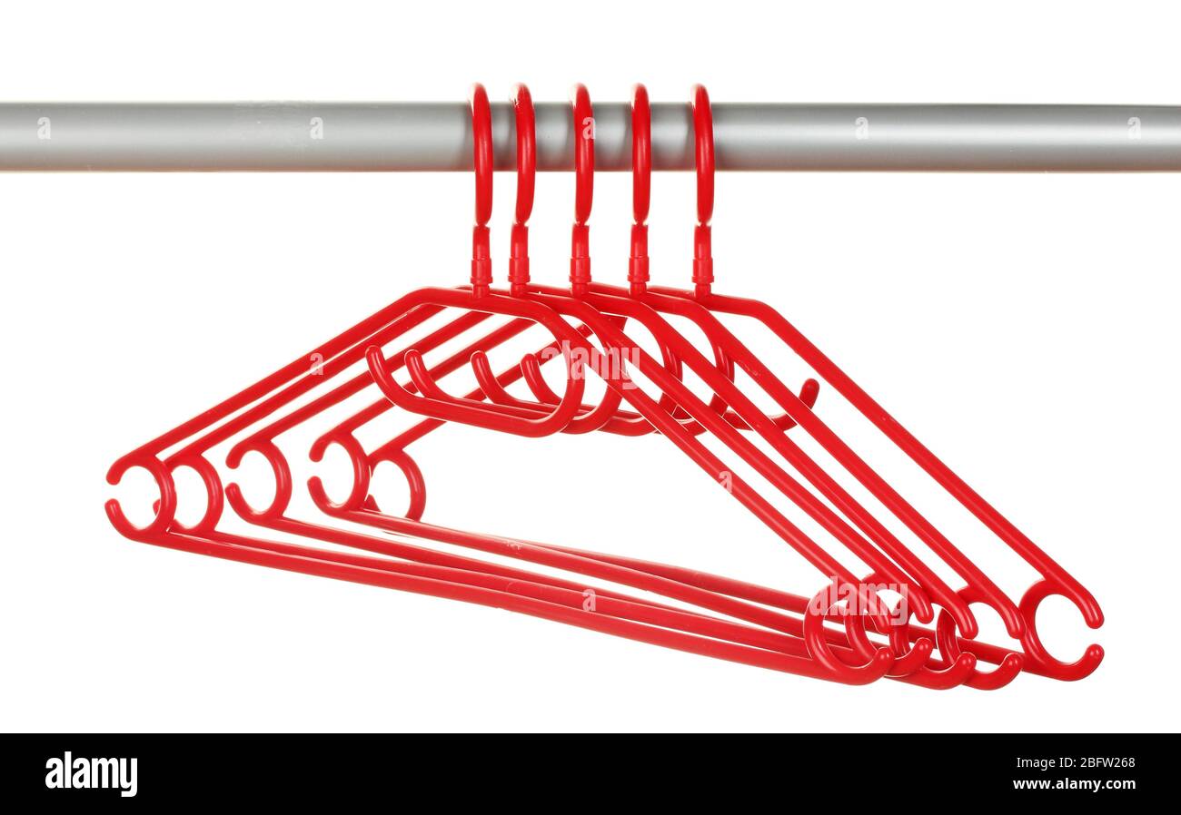 plastic hangers in row isolated on white Stock Photo Alamy