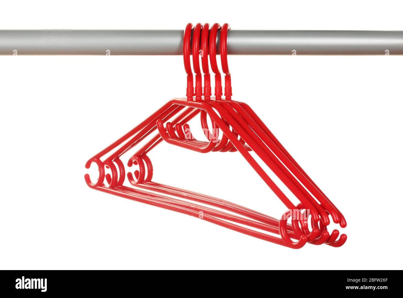 plastic hangers in row isolated on white Stock Photo Alamy