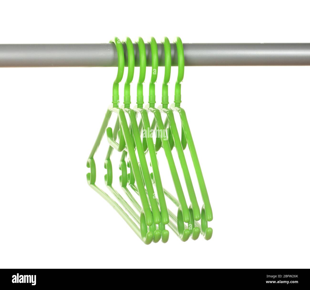 plastic hangers in row  isolated on white Stock Photo