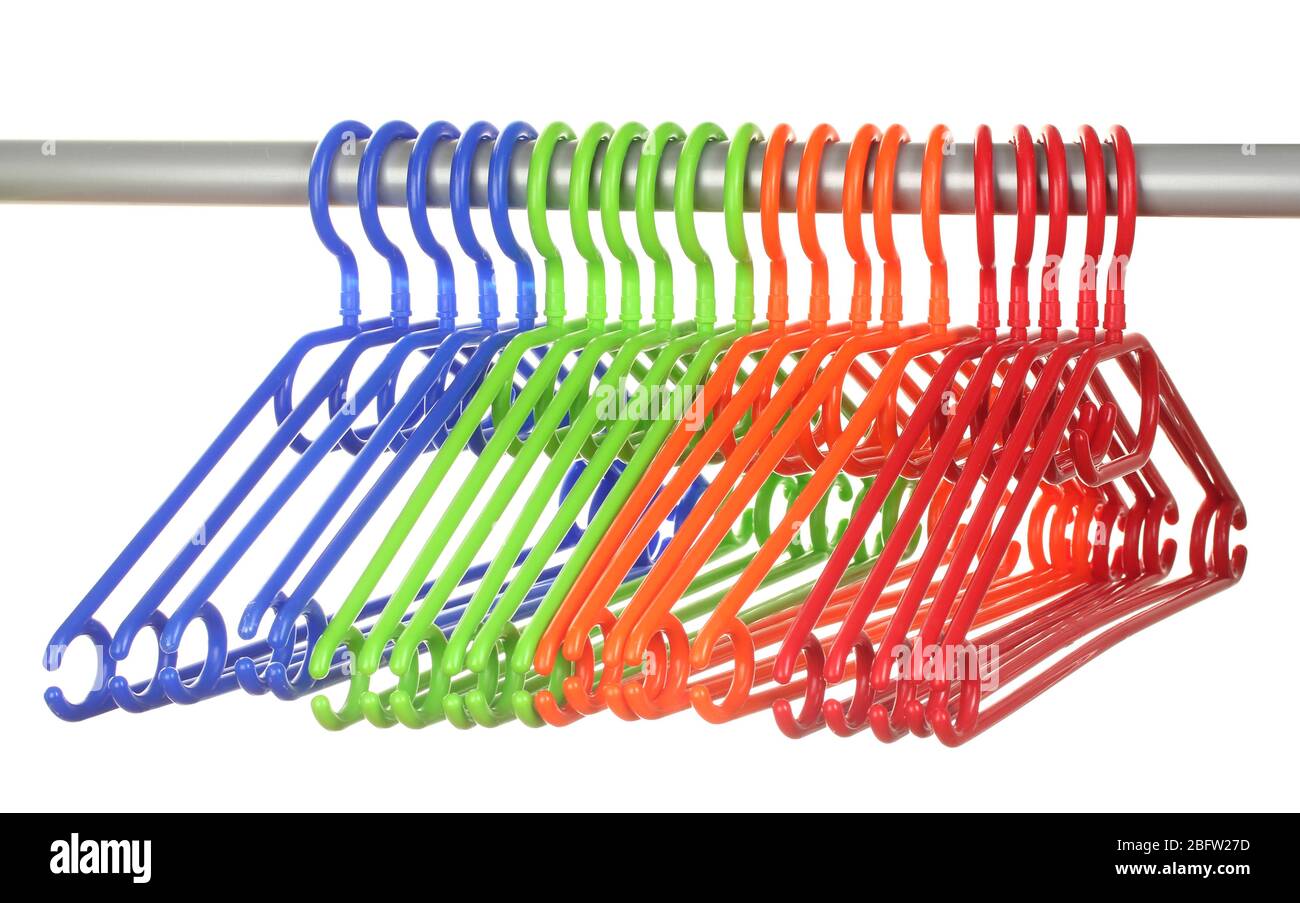 plastic hangers in row  isolated on white Stock Photo