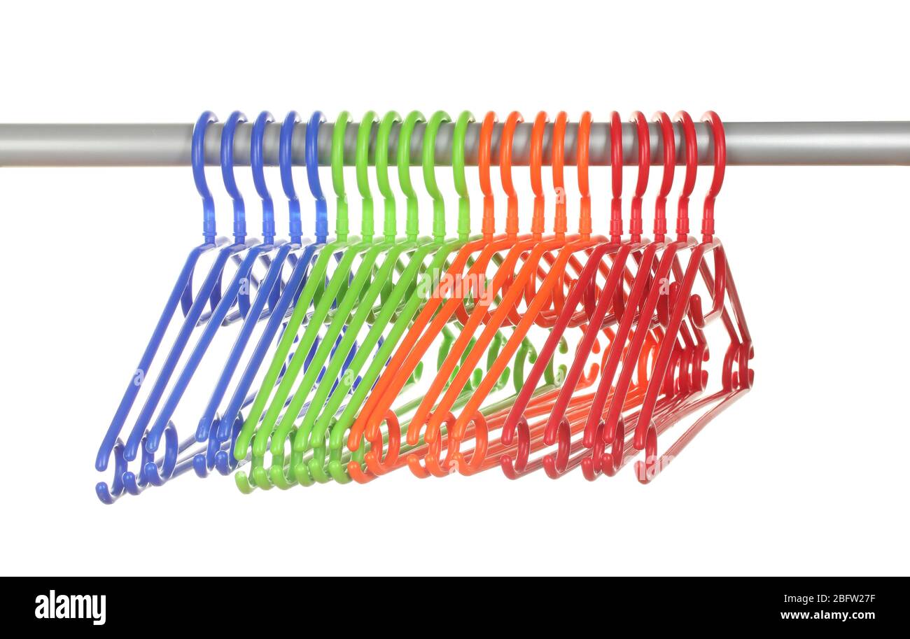 plastic hangers in row  isolated on white Stock Photo