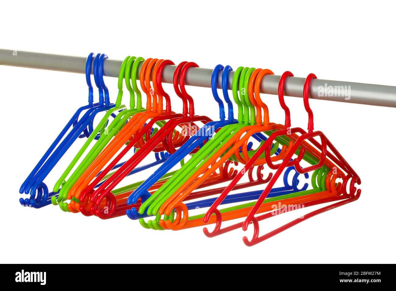plastic hangers in row  isolated on white Stock Photo
