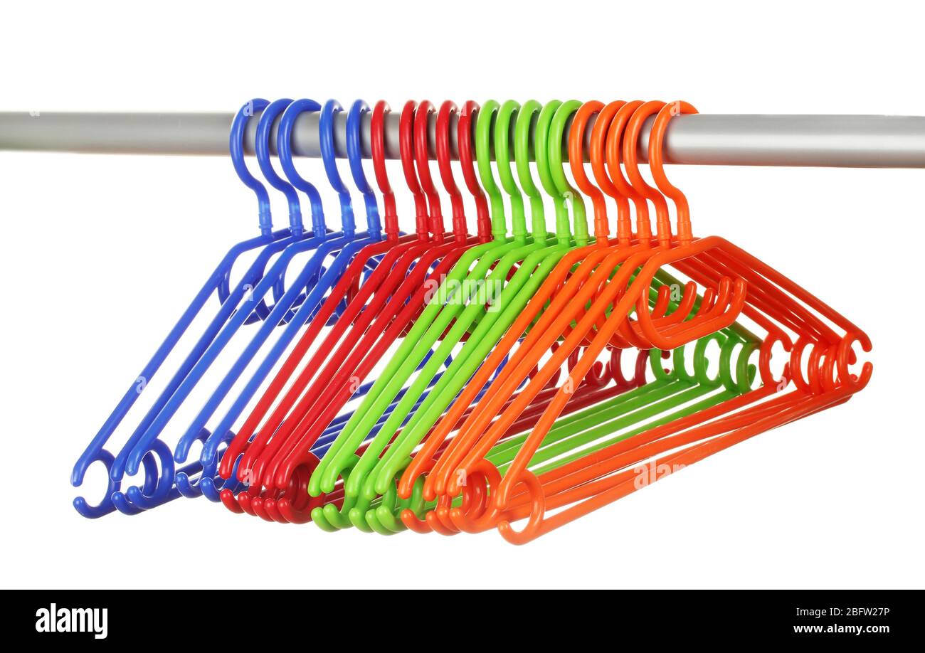 plastic hangers in row  isolated on white Stock Photo