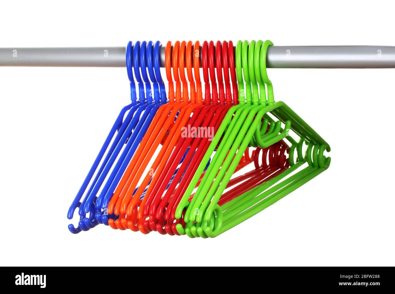 plastic hangers in row  isolated on white Stock Photo