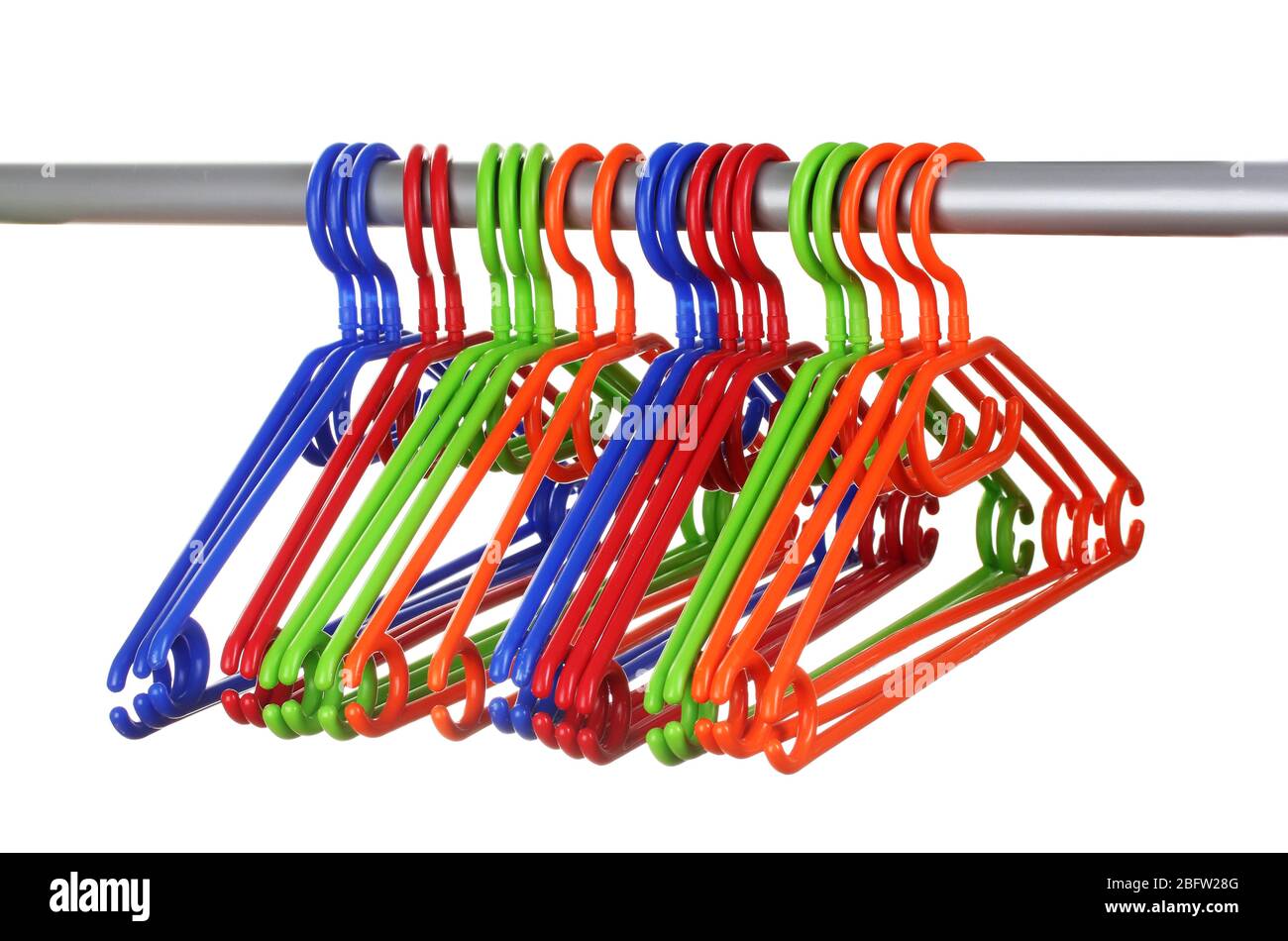 plastic hangers in row  isolated on white Stock Photo