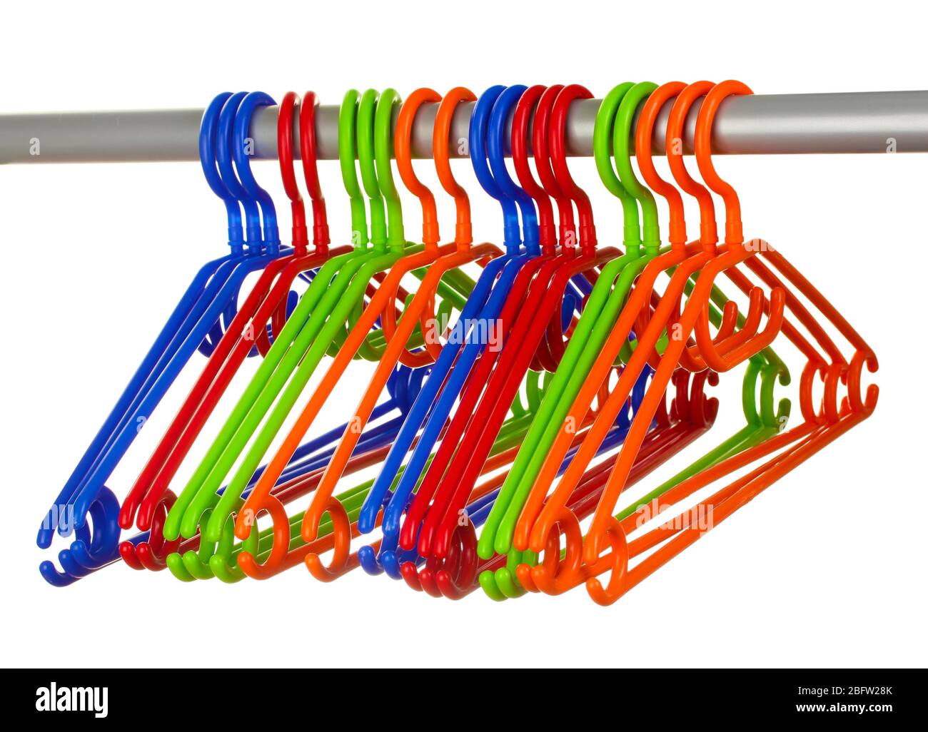 plastic hangers in row  isolated on white Stock Photo