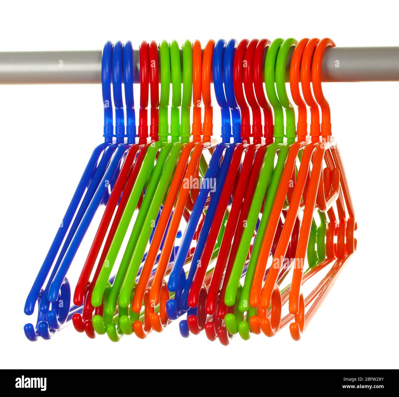 plastic hangers in row  isolated on white Stock Photo