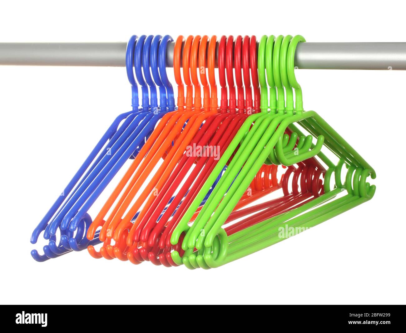 plastic hangers in row  isolated on white Stock Photo