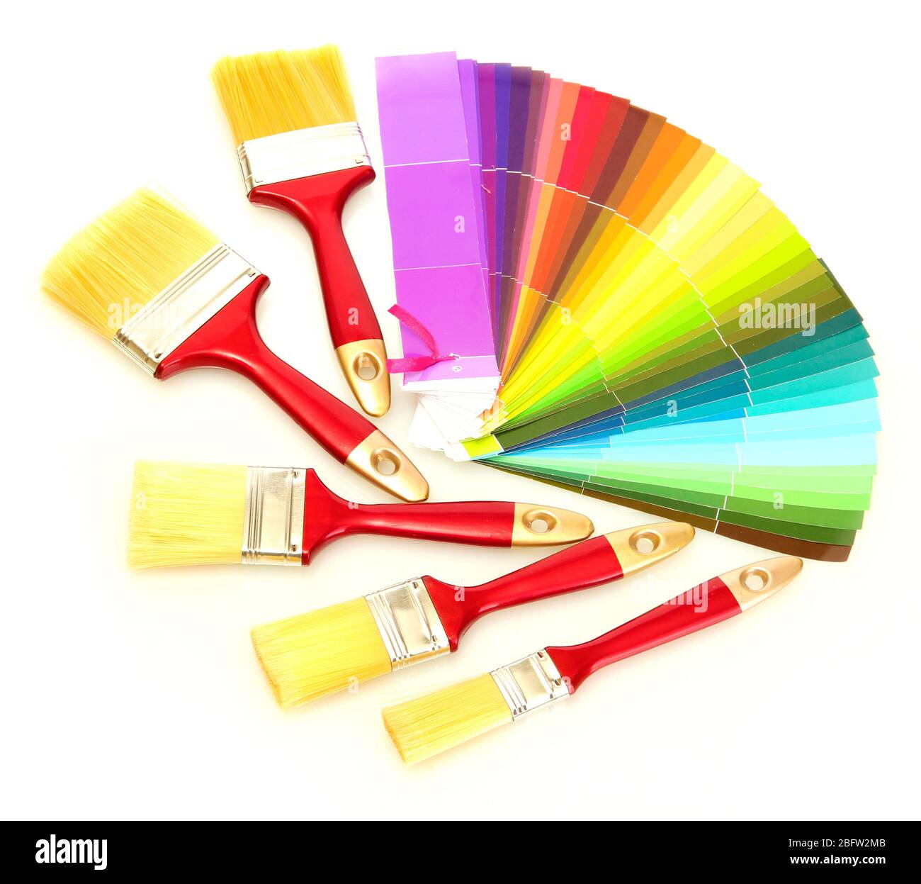 paint brushes and bright palette of colors isolated on white Stock