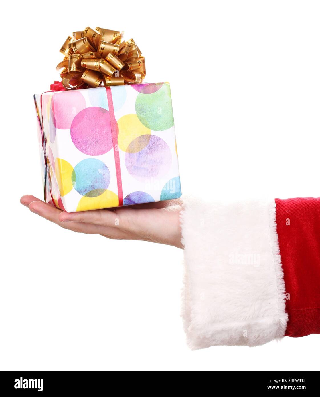 Santa Claus hand holding gift box isolated on white Stock Photo - Alamy