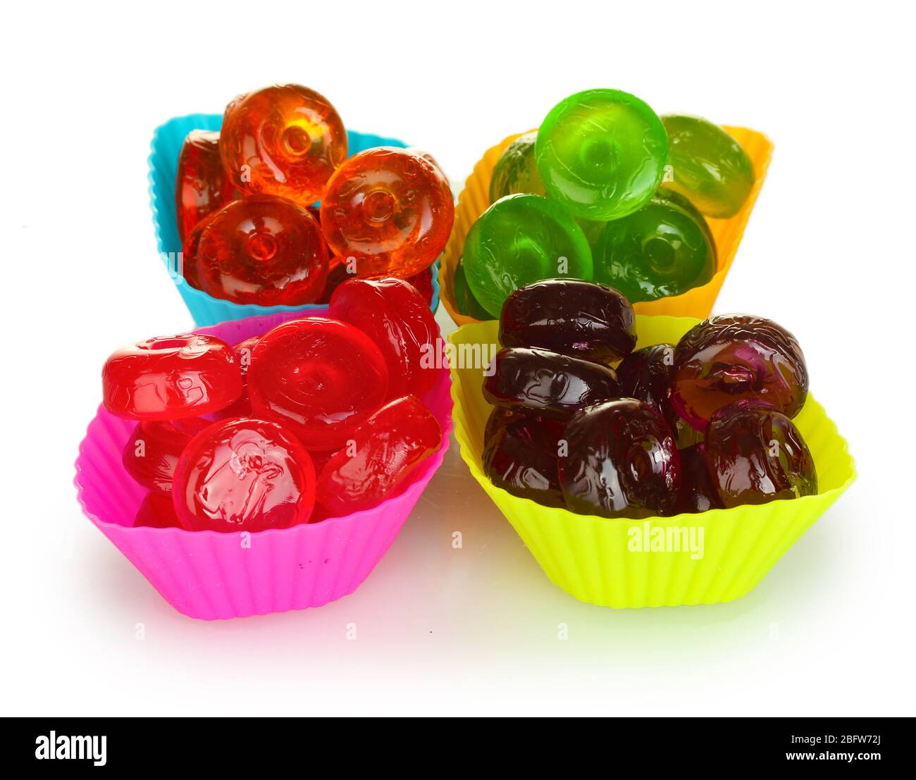 Tasty colorful candies isolated on white background Stock Photo - Alamy