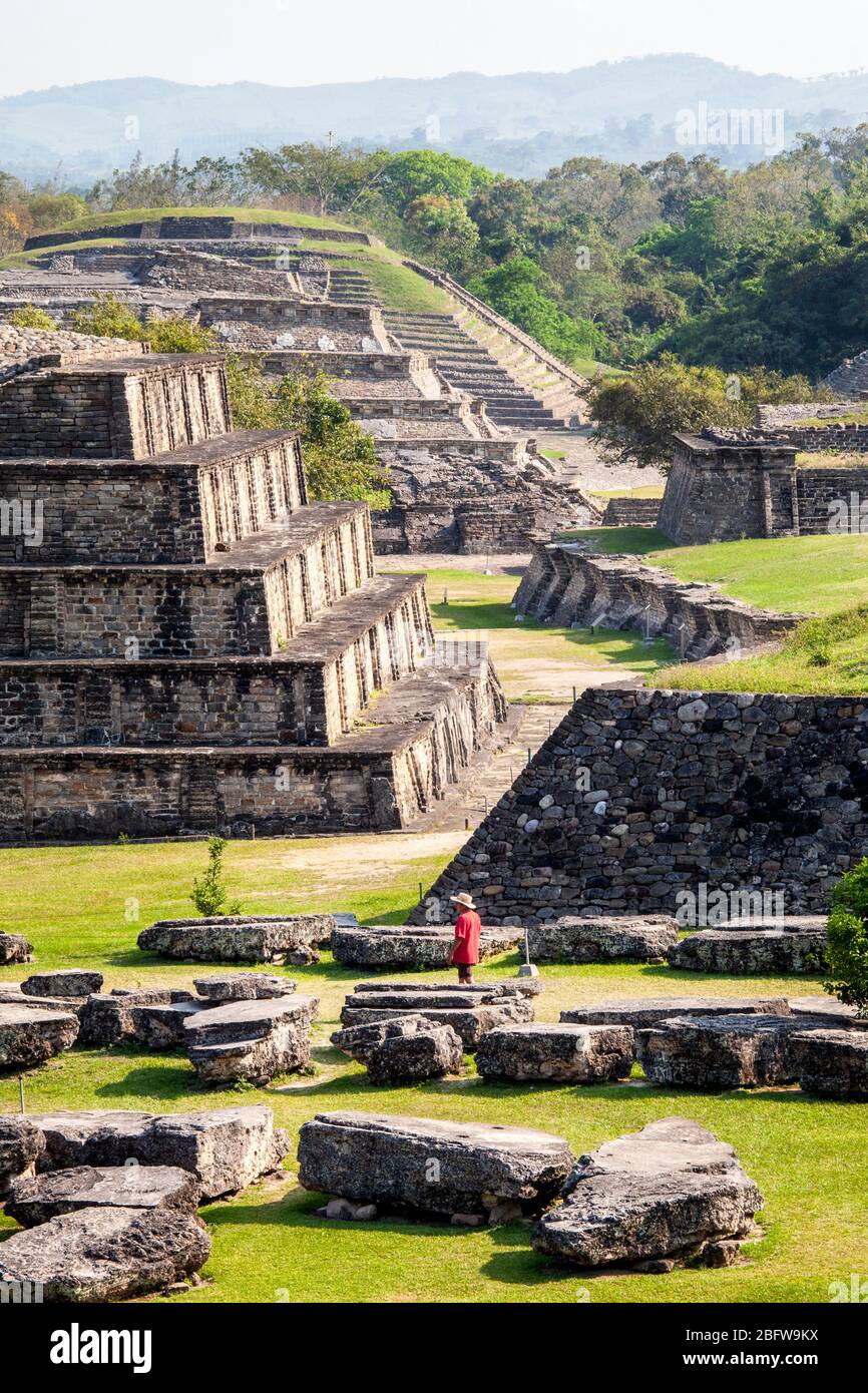 Tourist surveys the central plaza at the Tajin ruins in Veracruz, Mexico. Stock Photo