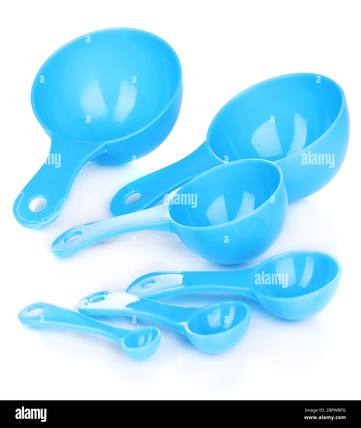 multicolored plastic measuring spoons in grams isolated on white Stock  Photo - Alamy