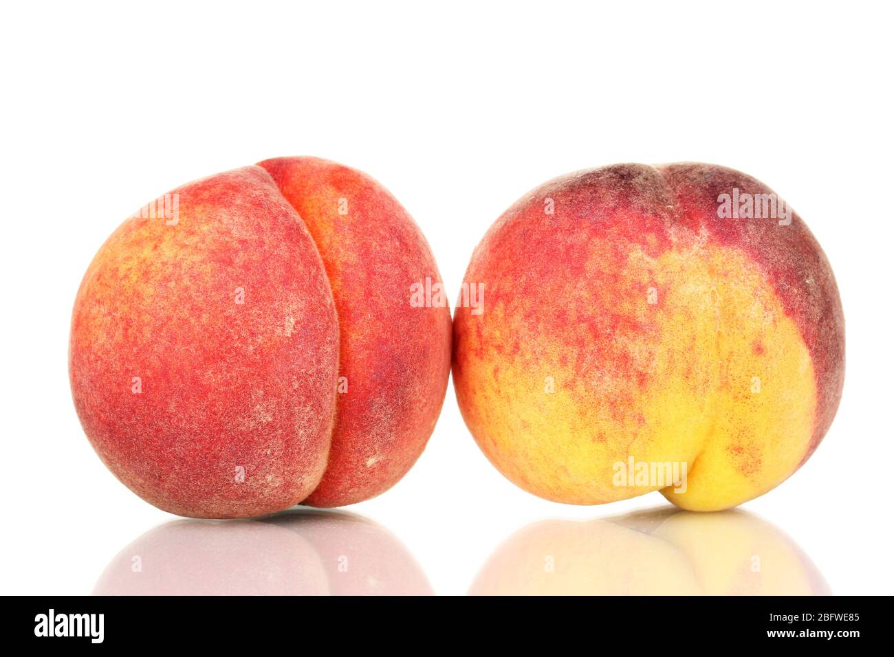 Two vibrant peaches hi-res stock photography and images - Alamy