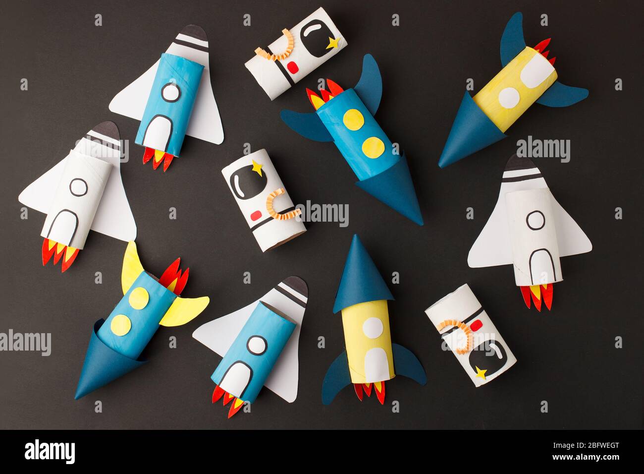 School kindergarten crafts, paper spaceship, shuttle, astronaut on black  background with copy space for text. Party concept handcraft, diy, creative  i Stock Photo - Alamy
