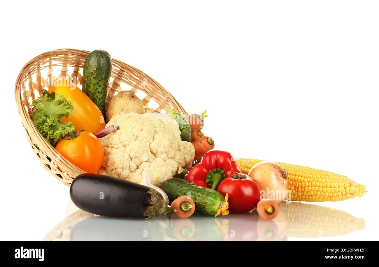 Fresh vegetables in wicker basket isolated on white Stock Photo - Alamy