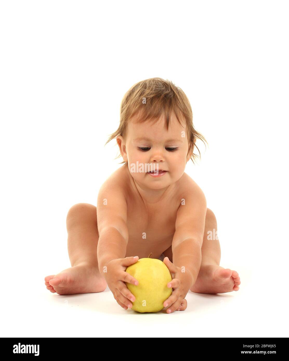 Cute baby with apple isolated on white Stock Photo