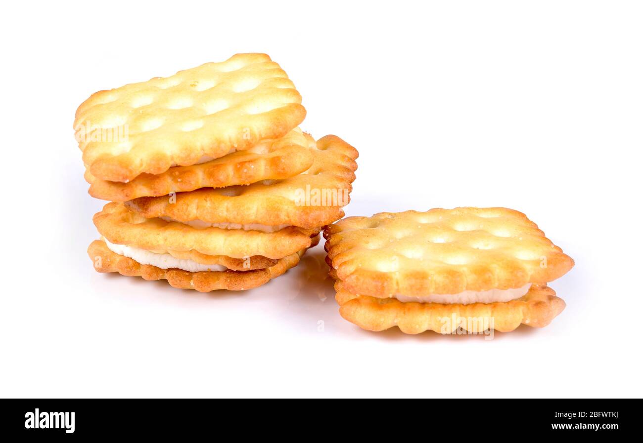 Cream cracker biscuits on white background Stock Photo Alamy