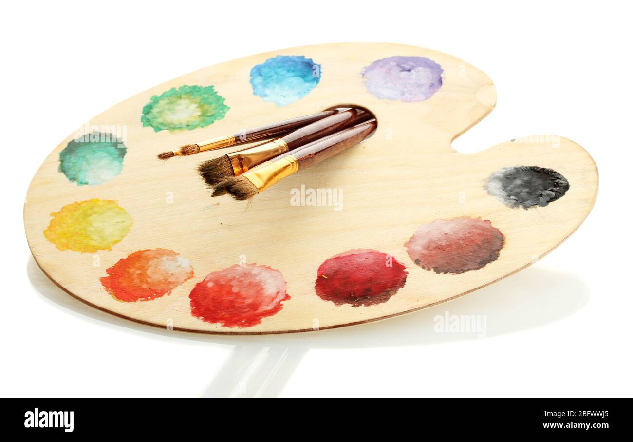 wooden art palette with paint and brushes isolated on white Stock Photo ...