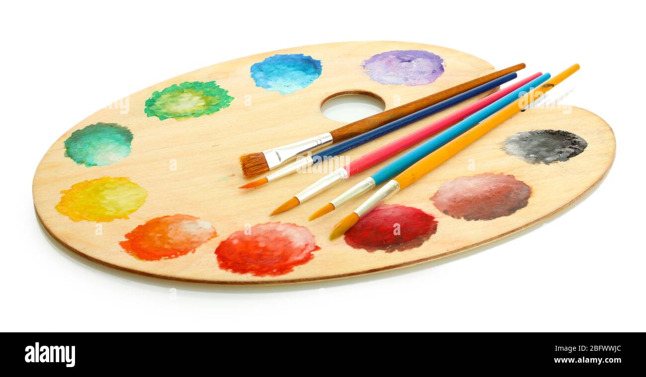 wooden art palette with paint and brushes isolated on white Stock Photo ...