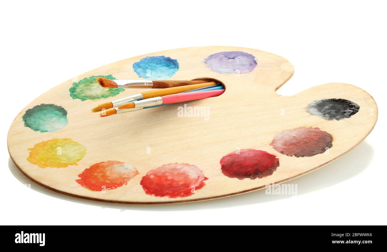 wooden art palette with paint and brushes isolated on white Stock Photo ...