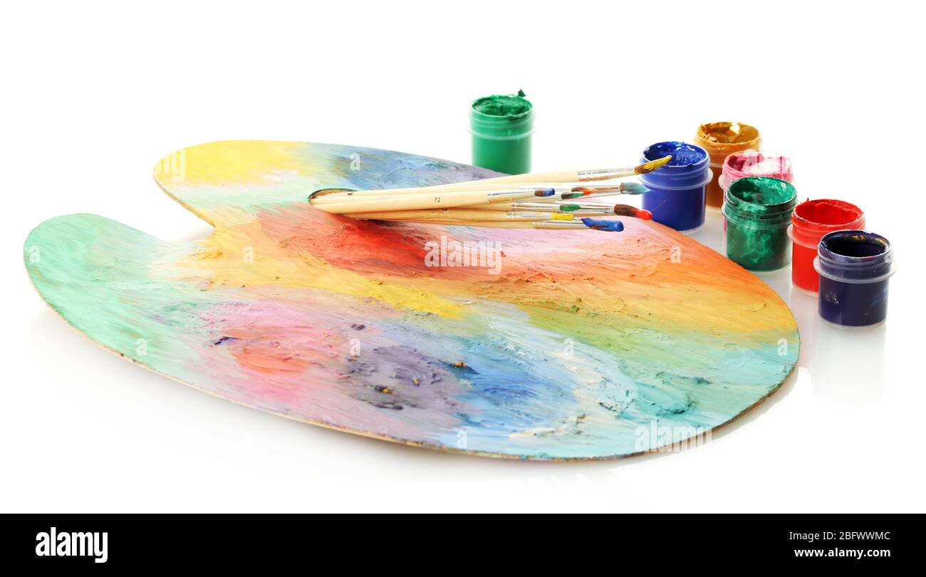wooden art palette with paint and brushes isolated on white Stock Photo ...