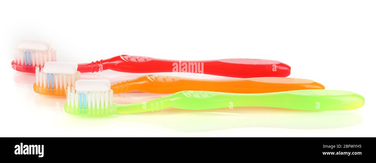 Toothbrushes and chewing gum isolated on white Stock Photo Alamy