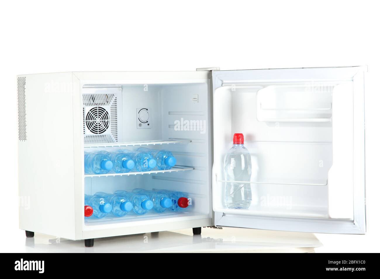 mini fridge full of bottled water isolated on white Stock Photo Alamy