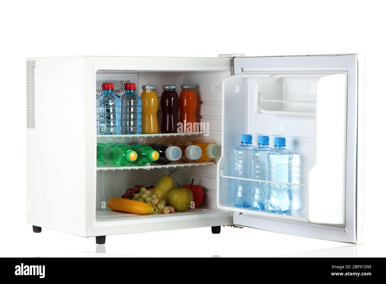 mini fridge full of bottles of juice, soda and fruit isolated on white