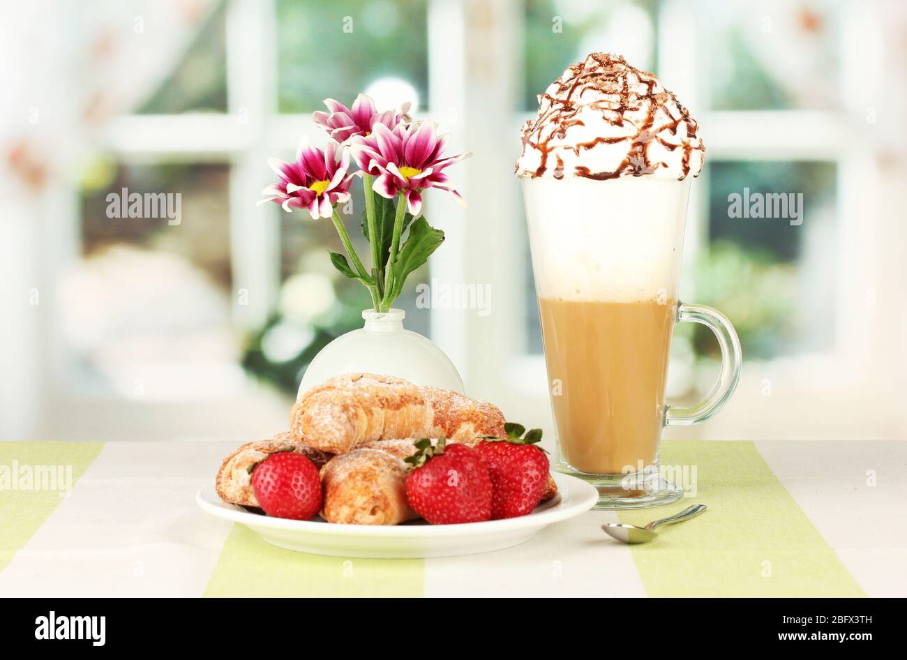 delicious bagels and fresh coffee on the table close-up Stock Photo