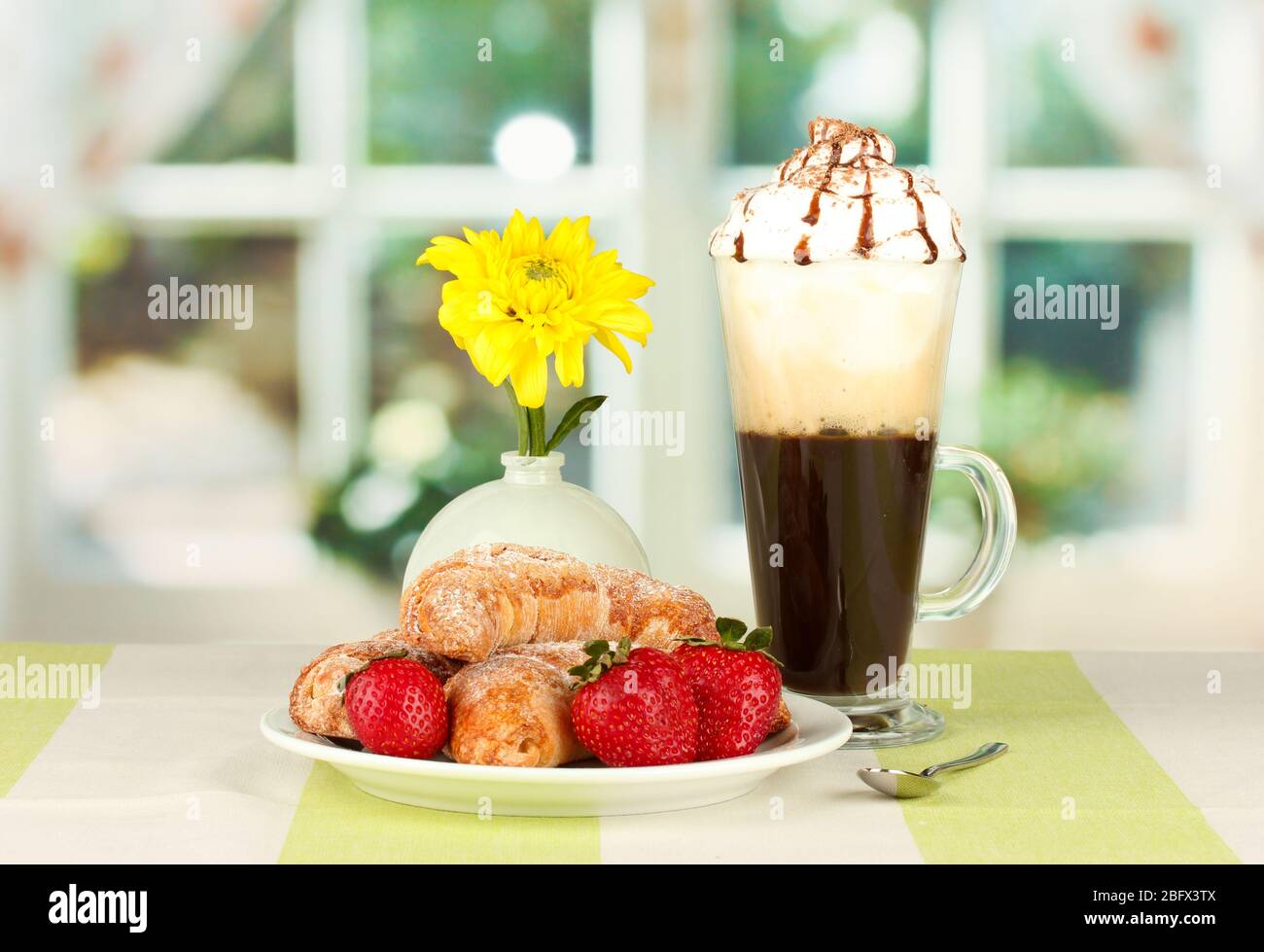 delicious bagels and fresh coffee on the table close-up Stock Photo