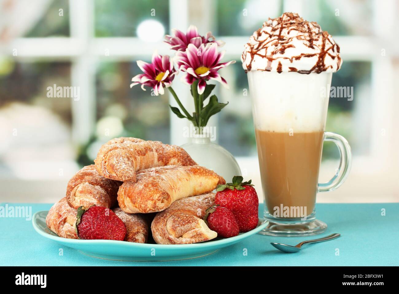 delicious bagels and fresh coffee on the table close-up Stock Photo