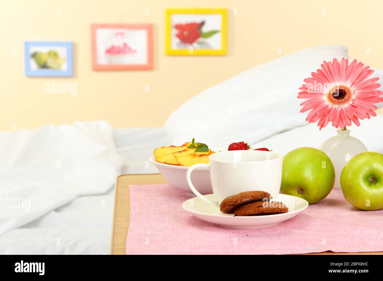 light breakfast on the nightstand next to the bed Stock Photo Alamy