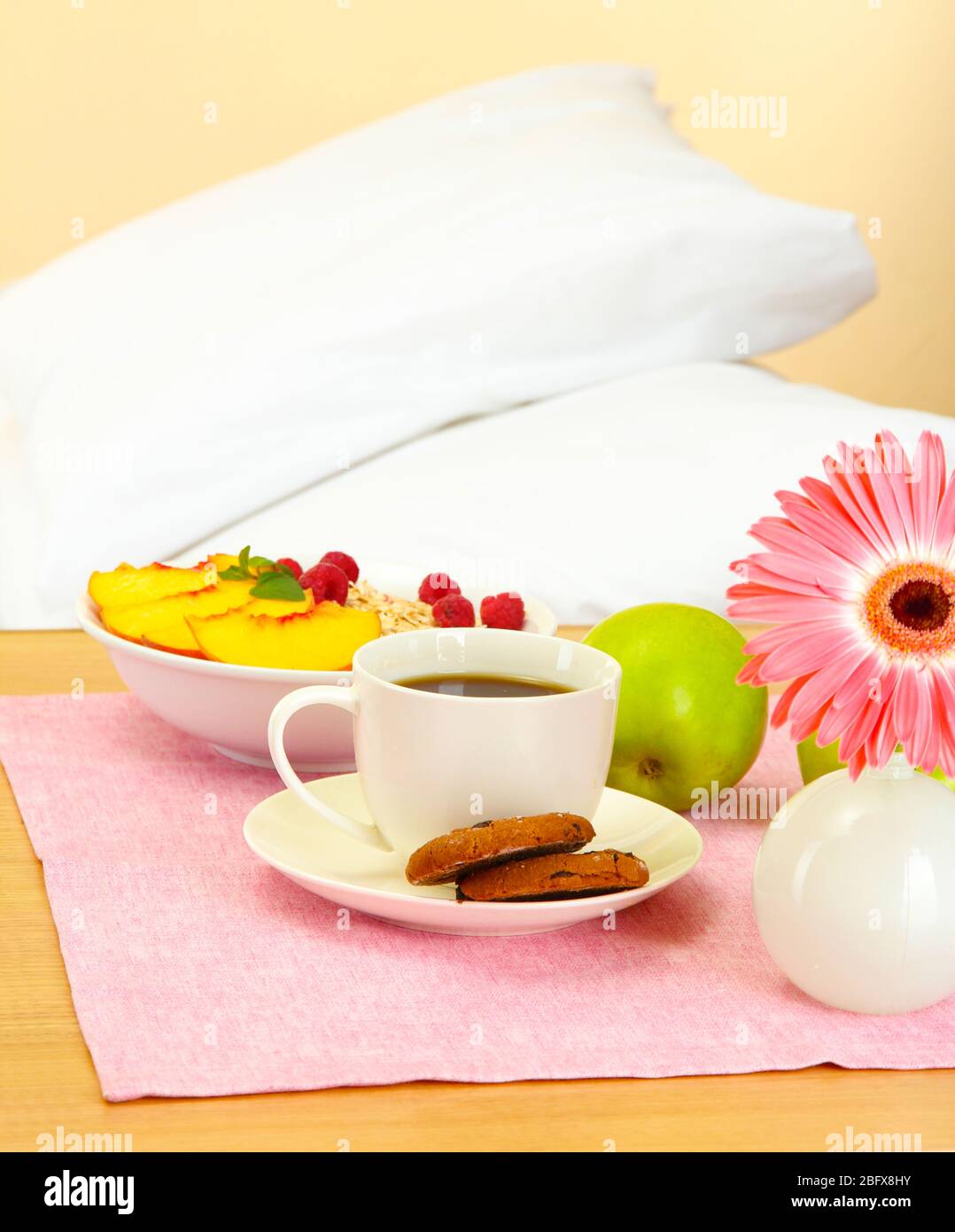 light breakfast on the nightstand next to the bed Stock Photo Alamy