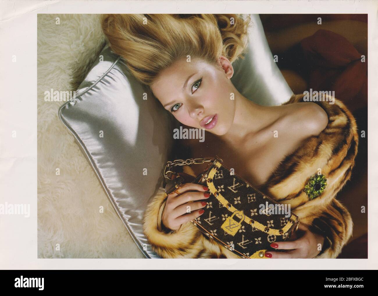 poster advertising Louis Vuitton handbag with Madonna in paper magazine  from 2009, advertisement, creative LV advert from 2000s Stock Photo - Alamy
