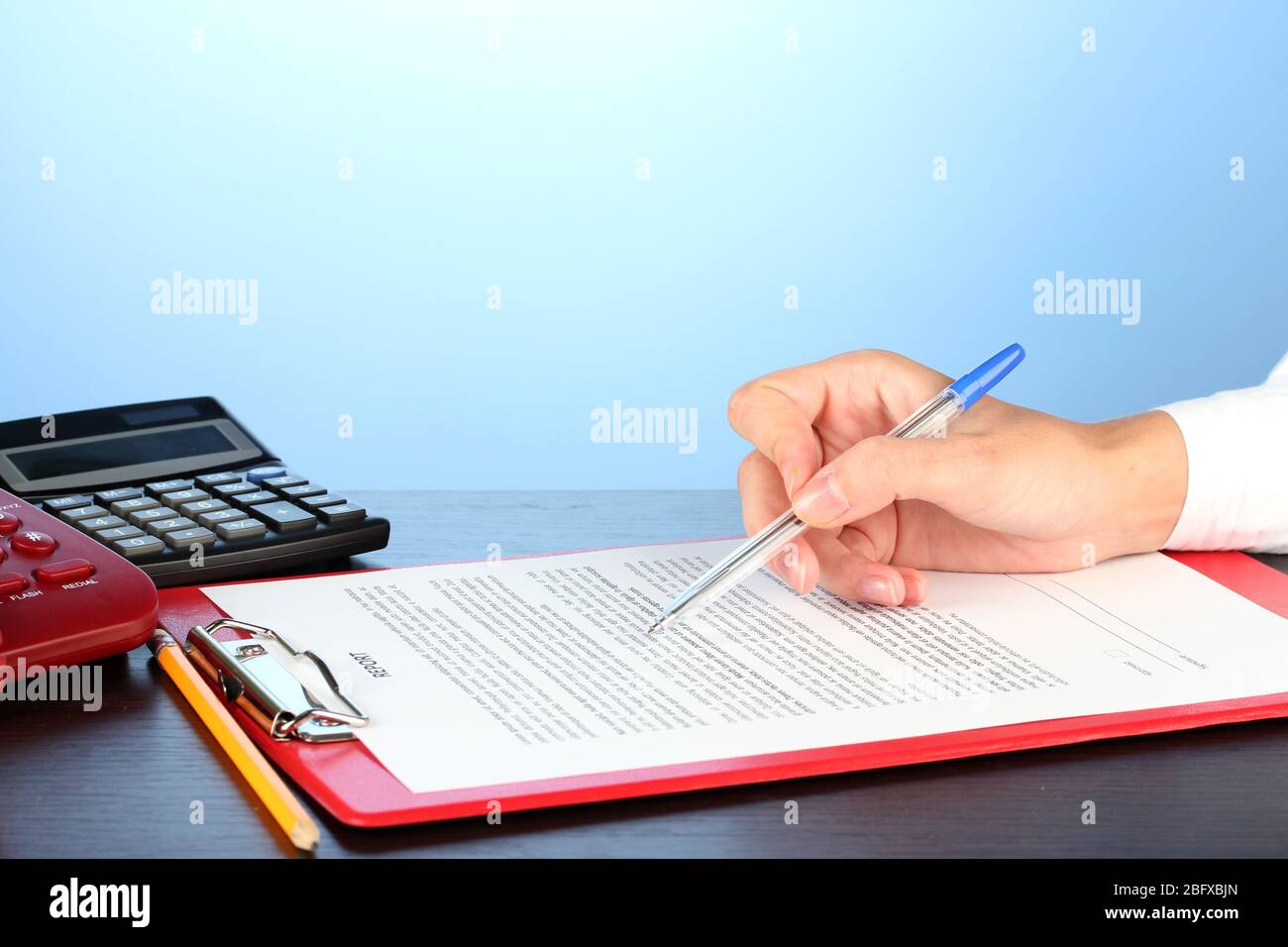 Signing sign ballpoint blue signature hi-res stock photography and images - Alamy