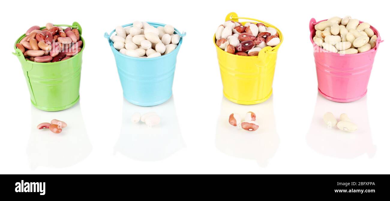 Different types of beans in colored buckets isolated on white Stock